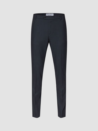 Motion Suit-bukse, slim, midnattsblå: mørkeblå dressbukse i slim fit med knappelukking, presselinjer foran og 360°-stretch.