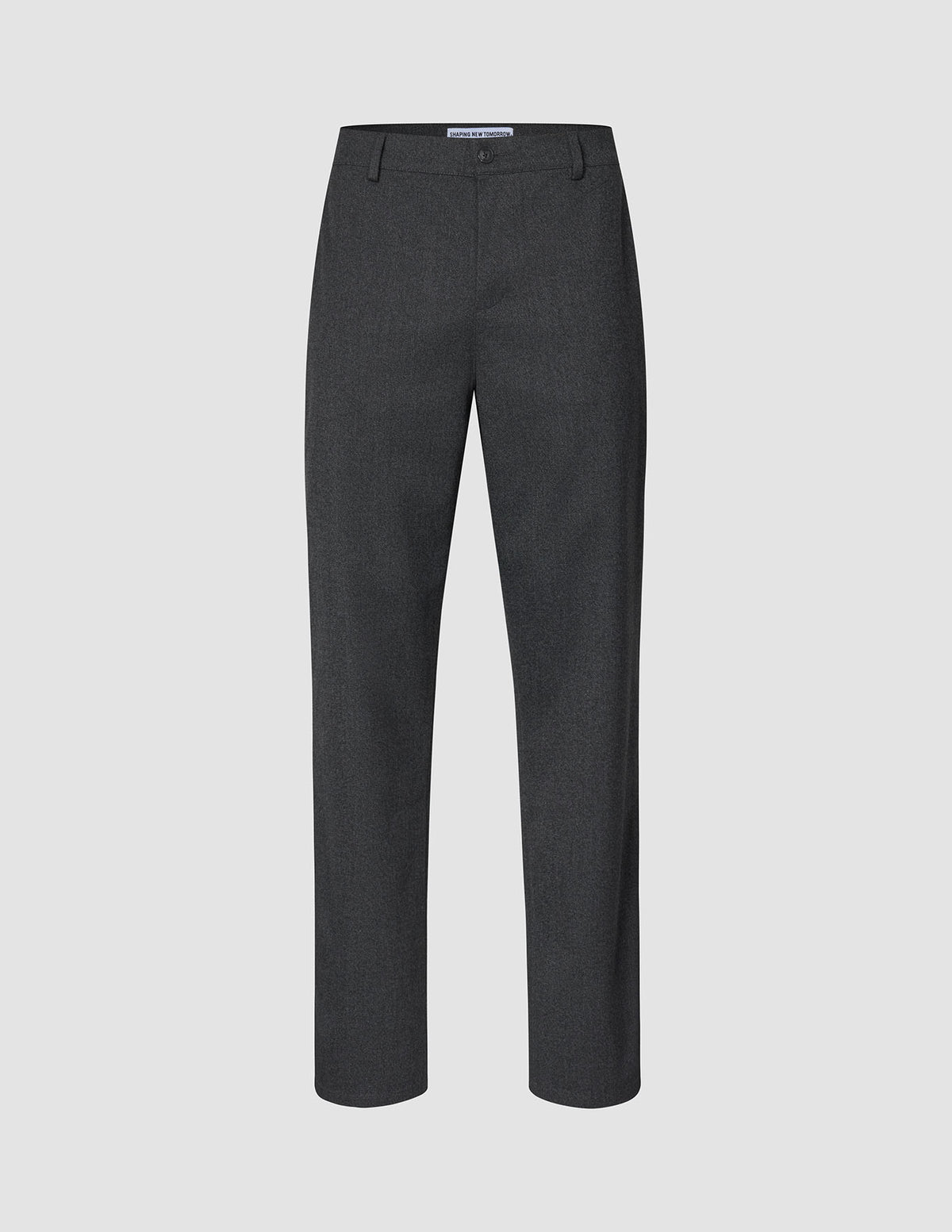 Atelier-bukser i mørkegrått, med avslappet passform, brutt twill og knappelukking, i en ren skandinavisk stil.