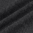 Nærbilde av Atelier Pants Relaxed i mørkegrått, i strukturert brutt twill med diskrete diagonale folder.