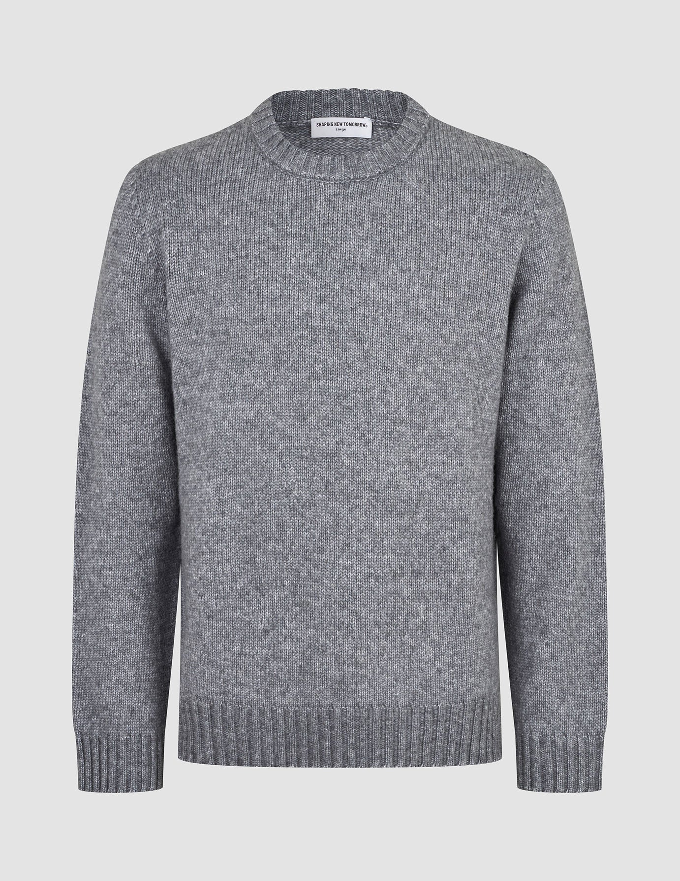 Tykk, myk ullgenser med rund hals i fargen Glacier Grey, med strukturert strikk, ribbede mansjetter og ribbet nederkant.